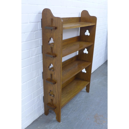 266 - A Liberty and Co Arts and Crafts oak open bookcase with plaque to the back, 83 x 117 x 25cm.