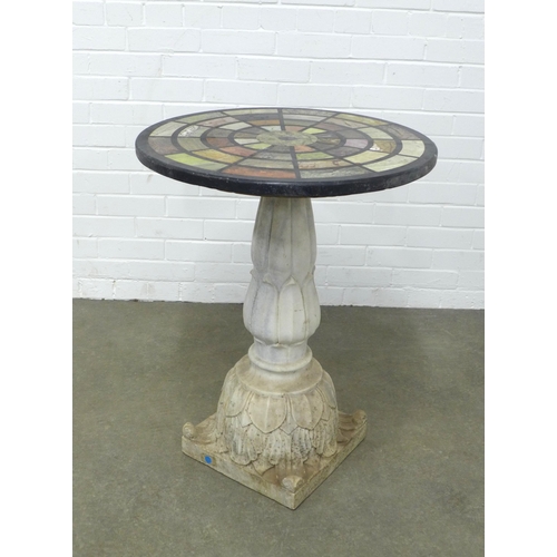 282 - Garden table with Italian specimen marble style circular top, on a stone column base,  61 x 78cm.