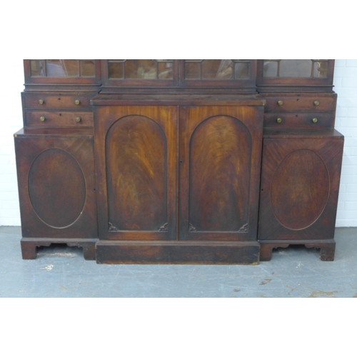 291 - 19th century mahogany breakfront library bookcase, the top of one cupboard door stamped Gillows Lanc... 