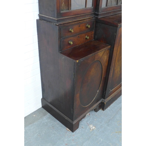 291 - 19th century mahogany breakfront library bookcase, the top of one cupboard door stamped Gillows Lanc... 