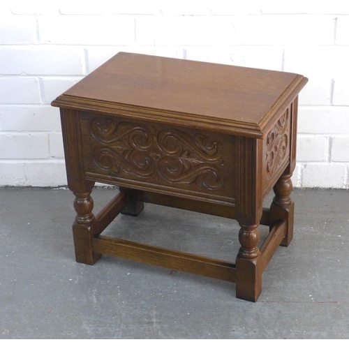 300 - Oak stool, with lift up lid for storage, and carved side panels, 44 x 40 x 30cm