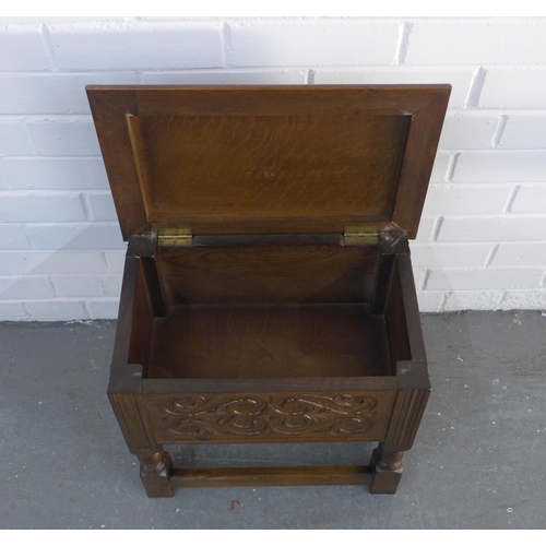 300 - Oak stool, with lift up lid for storage, and carved side panels, 44 x 40 x 30cm