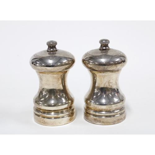 37 - A pair of Mappin & Webb silver pepper grinders, London 1994, 8cm (2)