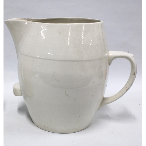 435 - A large white glazed dairy pitcher, 31cm,