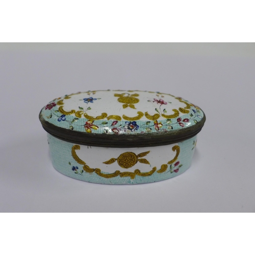 474 - Staffordshire enamel patch box, oval form with with floral spray decoration,9cm