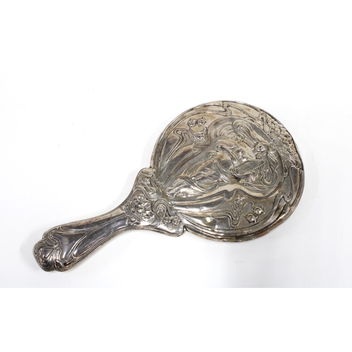 59 - An Art Nouveau silver backed hand mirror, Chester 1906, 28cm