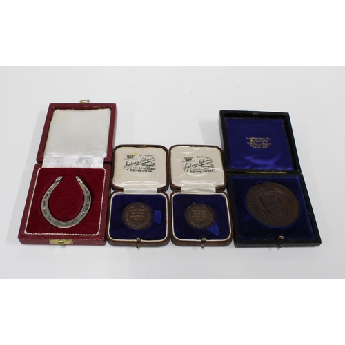 60H - Birmingham silver horseshoe together with  three bronze medallions (4)