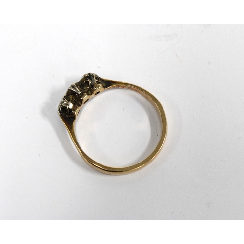 62 - Early 20th century three stone diamond ring, set in unmarked yellow metal, size N