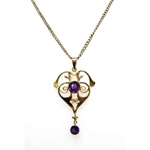 64 - An Edwardian 9ct gold & amethyst pendant on a 9ct gold chain, pendant and chain stamped 9ct