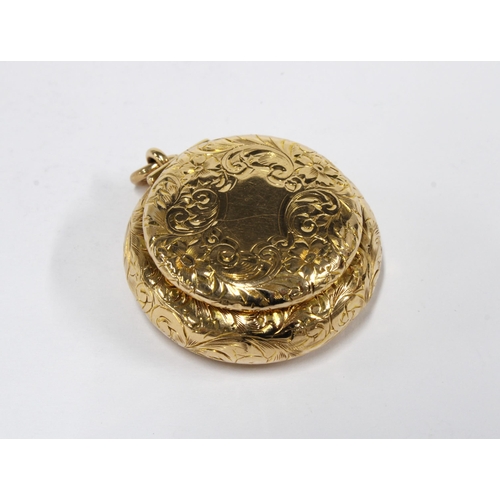 75 - 14ct gold pill box, foliate engraved and of circular form, stamped 14k