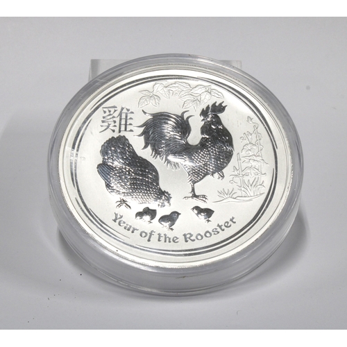 59B - A 2017 Australian $30 1kg 9999 grade silver 'coin', Year of the Rooster, encapsulated. Approx 10cm d... 