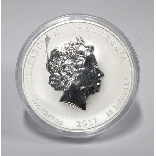 59C - A 2017 Australian $30 1kg 9999 grade silver 'coin', Year of the Rooster, encapsulated. Approx 10cm d... 