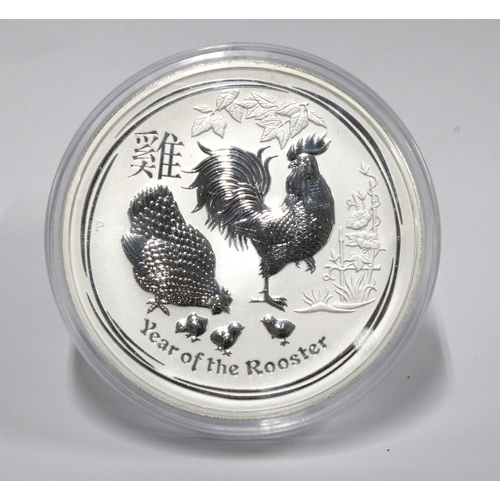 59C - A 2017 Australian $30 1kg 9999 grade silver 'coin', Year of the Rooster, encapsulated. Approx 10cm d... 