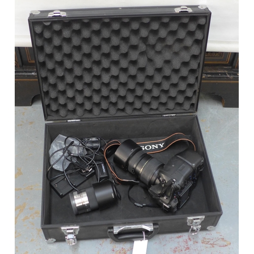 424 - Metal case containing a Sony A77II with a Sony 4.5-6.3/ 55-210 and a Tamron 70-300mm / 1:4-5.6 lens