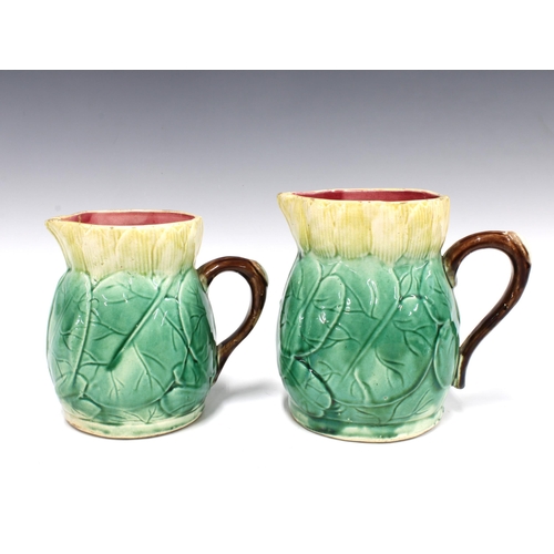 108 - Two Staffordshire majolica style  jugs decorated with moulded leaves and flower petals, taller 16cm ... 