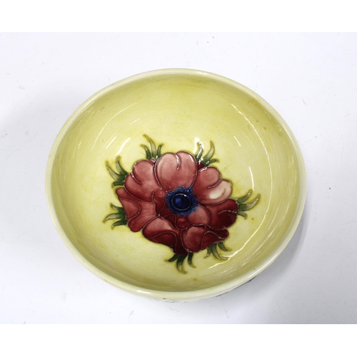 119 - Moorcroft anemone pattern bowl, yellow ground and plain circular footrim, with impressed marks and f... 