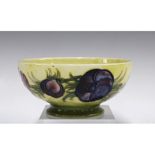 119 - Moorcroft anemone pattern bowl, yellow ground and plain circular footrim, with impressed marks and f... 