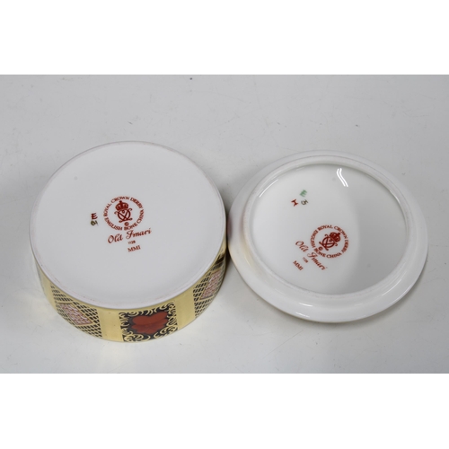 124 - Royal Crown Derby Old Imari circular trinket pot and cover, date code for 2001, with box, 8 x 4cm