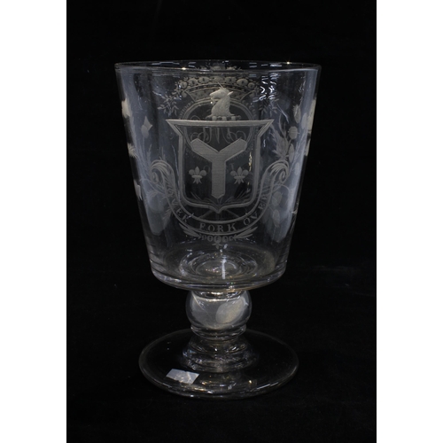 128 - A large early 19th century goblet with a 1787 coin in the stem, with etched monogram J.M.C 1830 surr... 