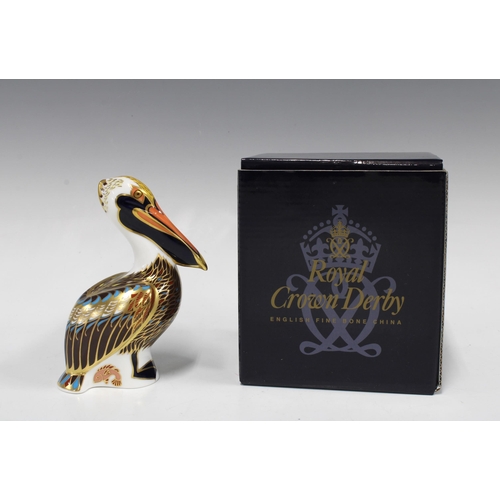 133 - Royal Crown Derby Imari paperweight in the form of a Brown Pelican, gold stopper and dated 1998, wit... 