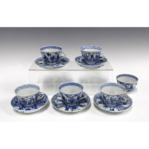 143 - Six blue and white Chinese tea cups, two a/f, 5.5cm, with five saucers, bearing Kangxi marks within ... 