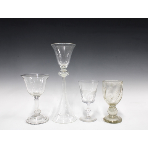 148 - Four glasses, one with engraved geese and 'Ann', two signed to include a double ended goblet by Zygm... 