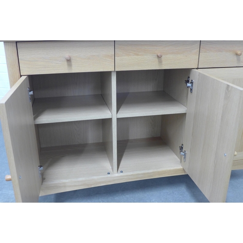 243 - John Lewis sideboard, 124 x 81 x 42cm.