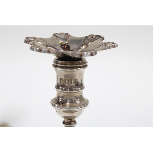 27 - A pair of Victorian silver chamber candlesticks, London 1896, with detachable sconce, knop stem and ... 