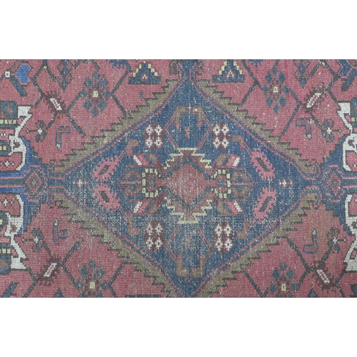 273 - Persian rug with blue and red field, 207 x 110cm.