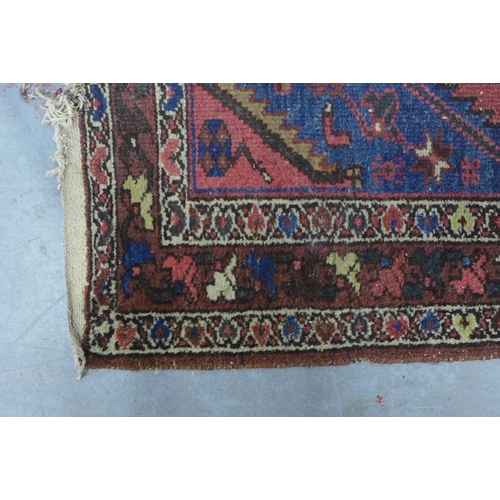 273 - Persian rug with blue and red field, 207 x 110cm.