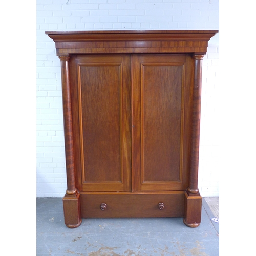 292 - Victorian mahogany wardrobe, projecting cornice over a pair of panelled doors flanked by columns, op... 