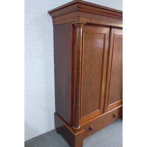 292 - Victorian mahogany wardrobe, projecting cornice over a pair of panelled doors flanked by columns, op... 