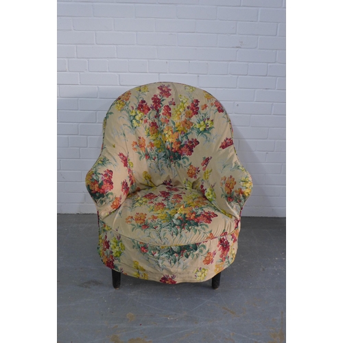 295 - Country House upholstered armchair, with loose floral cover and  an ornamental garden pattern beneat... 