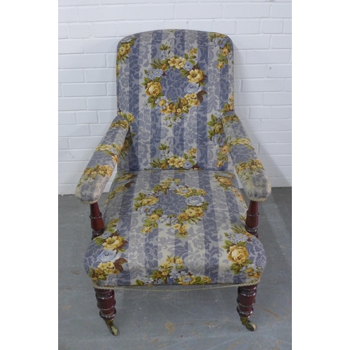 296 - 19th century Country House armchair, with later blue an yellow floral upholstery, 68 x 94 x 60cm.