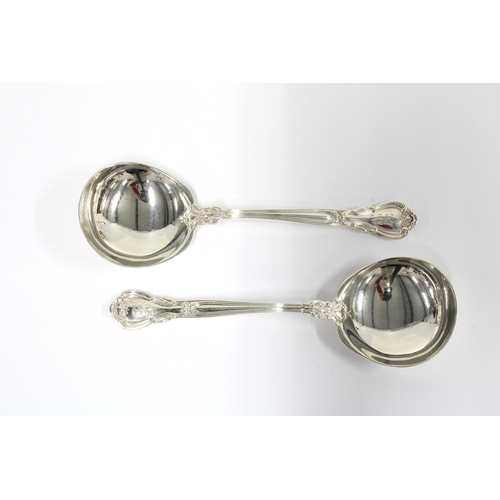 3 - A set of eleven spoons, stamped Patent 95 STERLING, 12.5cm long,  (11)