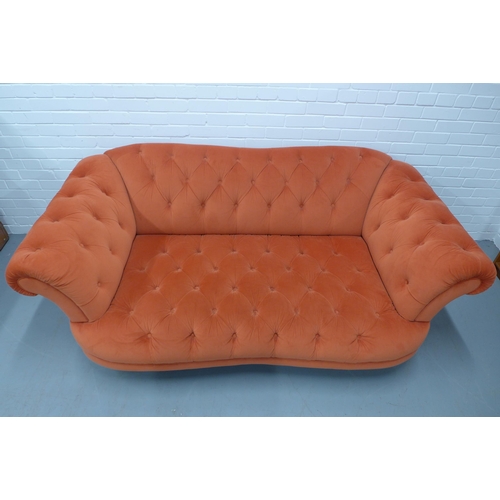 311 - Contemporary Chesterfield scroll arm settee, orange velvet buttonback upholstery, fluted wooden legs... 