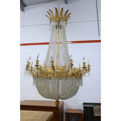 314 - A large glass and gilt metal tent and bag chandelier, 94 x 145cm (approx) (a/f some losses)