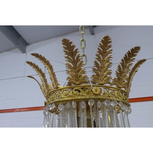 314 - A large glass and gilt metal tent and bag chandelier, 94 x 145cm (approx) (a/f some losses)