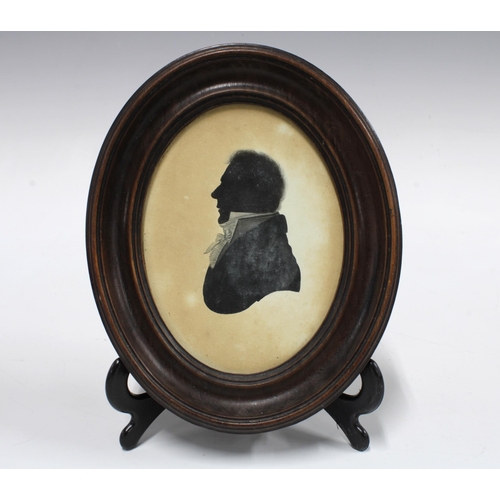 320 - An 18th century silhouette in monochrome wash, inscribed verso 'W Wellings fecit 1790 No.3 Tavistock... 