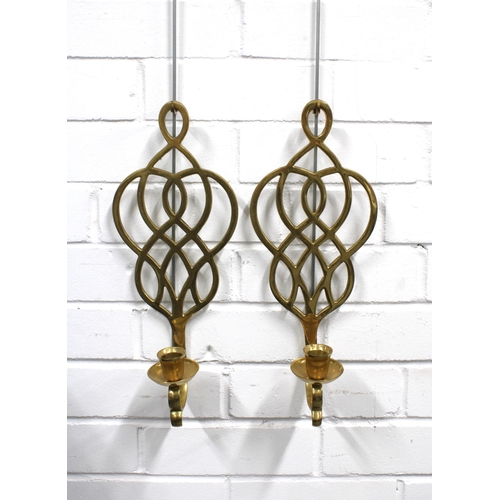 340 - Pair of brass wall mounted candle holders, with pierced decoration  15 x 38cm (2)