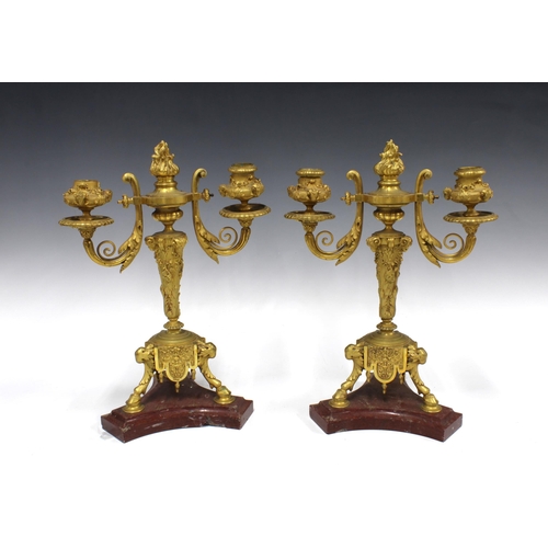 342 - Pair of French style  gilt metal candlesticks, on red faux hardstone bases, one base cracked, 32cm (... 