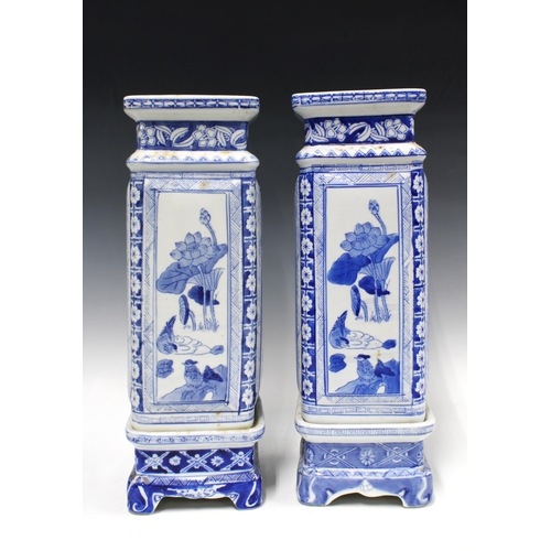 345 - A pair of Chinese blue and white square  vases on stands, 42cm (2)