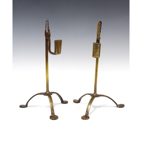 354 - Pair of brass rushnip table candlesticks on tripod feet, 28cm (2)