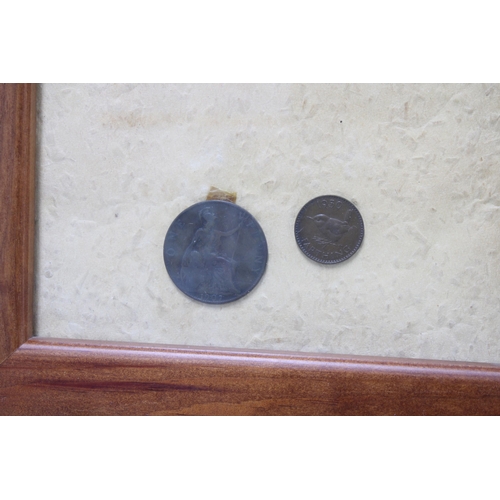 369 - Wooden frame containing a 1907 penny and a 1950 farthing, together with a treen candlestick 7cm, a l... 