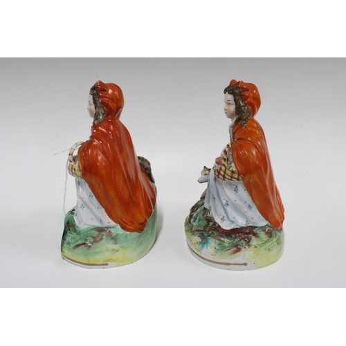 373 - Two Staffordshire red riding hood figures, 18cm (2)