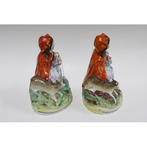 373 - Two Staffordshire red riding hood figures, 18cm (2)