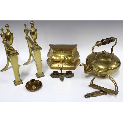 384 - Brassware including two fire dogs 31cm, a teapot  and a canister with registration number and stampe... 