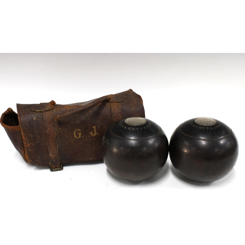 387 - Pair of Victorian lignum vitae bowling balls, inscribed 'G.B.C presented by M.B Paterson won by Geo ... 