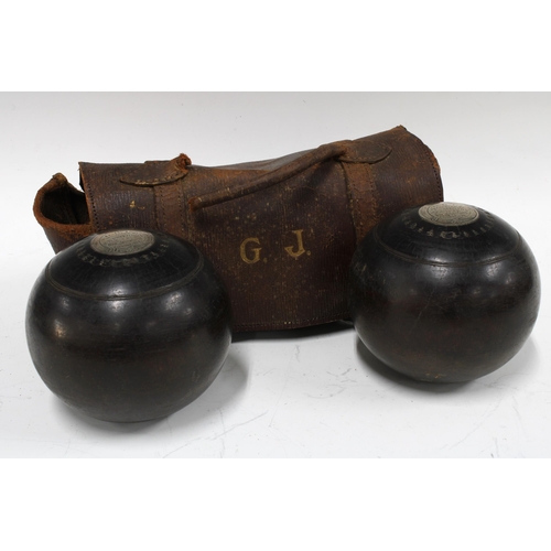 387 - Pair of Victorian lignum vitae bowling balls, inscribed 'G.B.C presented by M.B Paterson won by Geo ... 