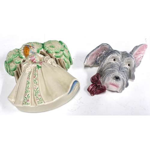 401 - Clarice Cliff Lady Anne wall pocket vase, 16 x 19cm, together with a dog head (2)